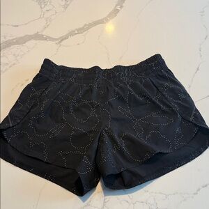 Athleta Black Athletic Shorts with Subtle Embellishments